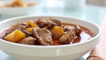 Фото рецепта Айва с говядиной — богатый вкус и сочность