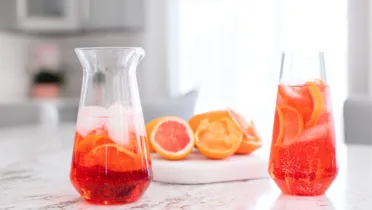 Фото рецепта Освежающий лимонад с яркой калиной