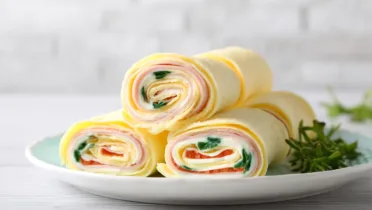 Фото блюда: Рулеты из блинов с нежной начинкой