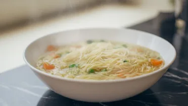 Фото рецепта Нежный суп лапша для детей с мягкими овощами