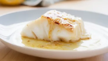 Фото блюда: Треска в мисо и юдзу с нежной текстурой и ярким вкусом