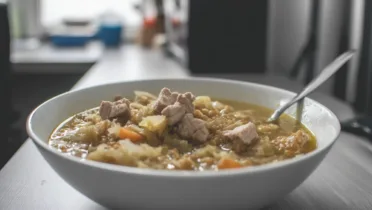 Фото рецепта Капустняк по украински на пшене: наваристо, с кислинкой и мясом