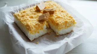 Фото рецепта: Рисовая запеканка с нугой — нежный десерт с хрустящей корочкой