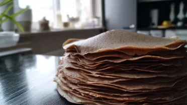 Фото блюда: Ржаные блины на кефире с золотистыми краями