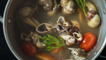 Фото блюда: Улитки в бульоне с сельдереем и морковью