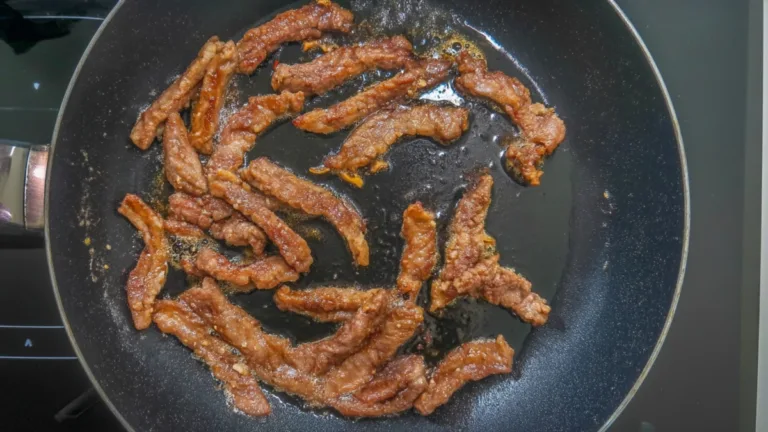 Фото блюда: Жареная свинина на кукурузном масле с чесночной карамельной корочкой