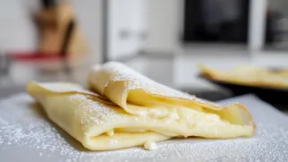 Фото рецепта: Нежные блинчики с кремовой начинкой и мягким сливочным вкусом