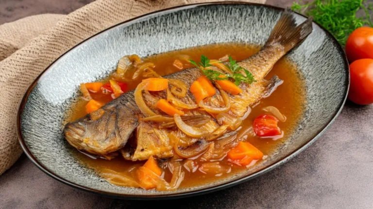 Фото блюда: Карась тушеный с овощами в насыщенном соусе как в деревенской кухне