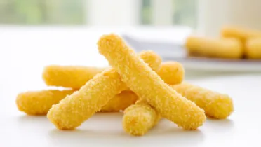 Фото рецепта Картофельные палочки с панировочными сухарями