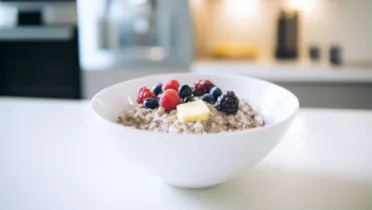 Фото рецепта Овсянка с ежевикой и теплым ягодным акцентом