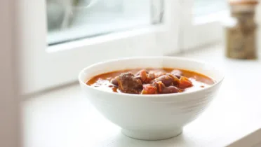 Фото рецепта Томленое рагу с навагой и фасолью – вкусный и сытный рецепт