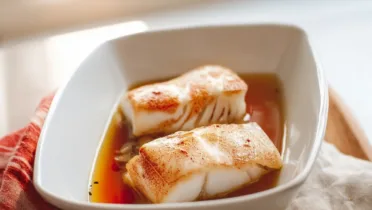 Фото рецепта Треска в красном вине – изысканный рыбный рецепт