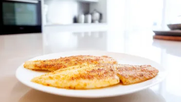 Фото рецепта Нежный морской язык с румяной корочкой на сковороде