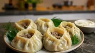 Фото рецепта: Буззы бурятские с бараниной и луком сочные паровые