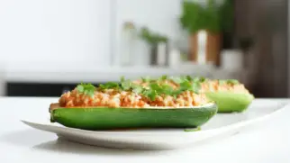 Фото рецепта: Цукини фаршированные рисом и томатами