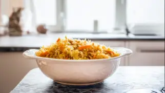 Фото рецепта: Овощной плов с пальмовым маслом и зирой
